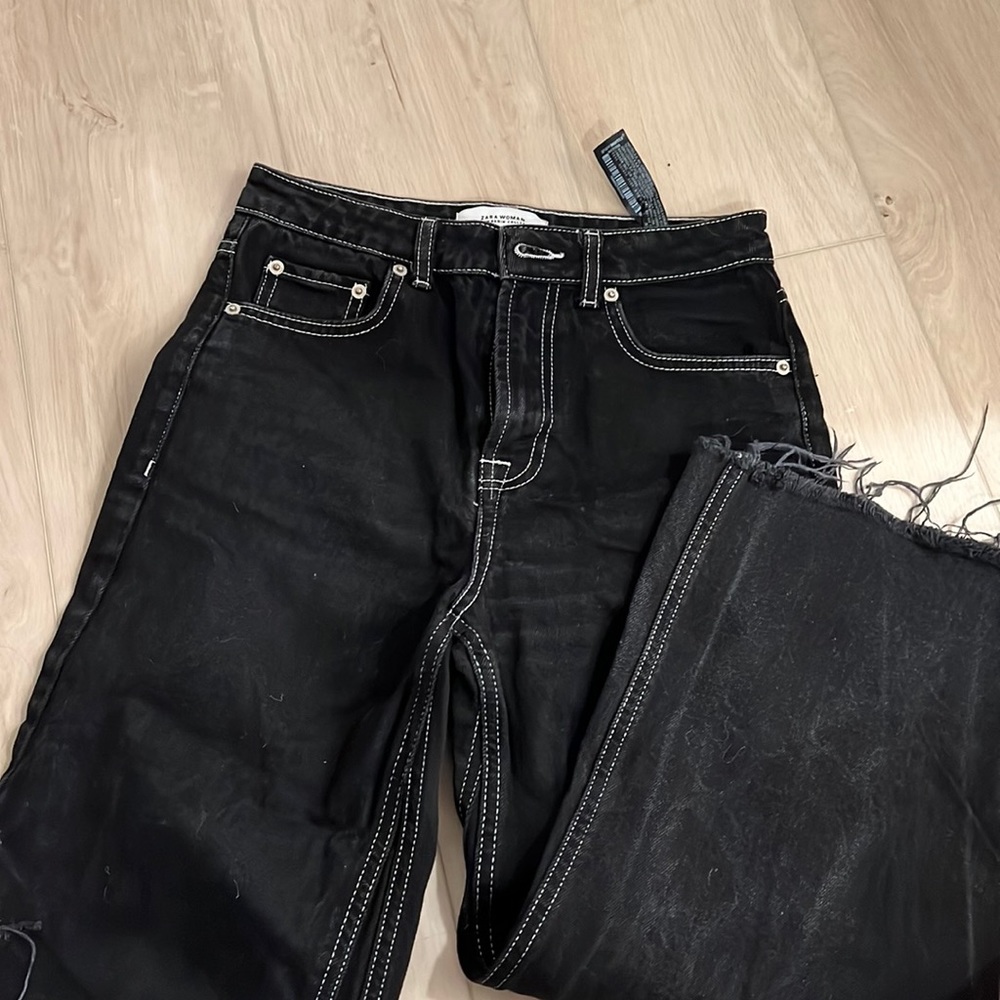 Black Zara jeans with white stitching